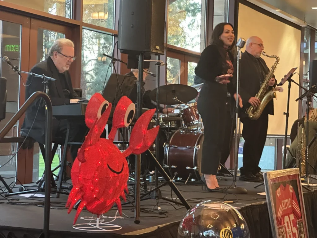 Wayne Fettig's band performing on stage.