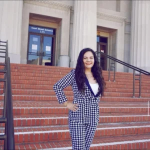 picture of a woman in front of a courthouse's steps